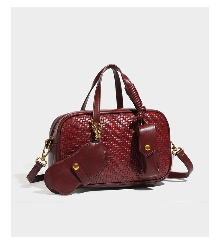 Strukturierte rechteckige Satchel-Tasche mit gewebtem Vorderteil in Lederoptik, goldfarbenen Details, zwei Tragegriffen und abnehmbarem