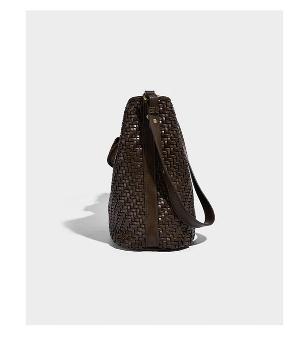 Woven leather-look bucket bag with basket-weave texture, attached mini pouch, and adjustable shoulder strap, detail view 13