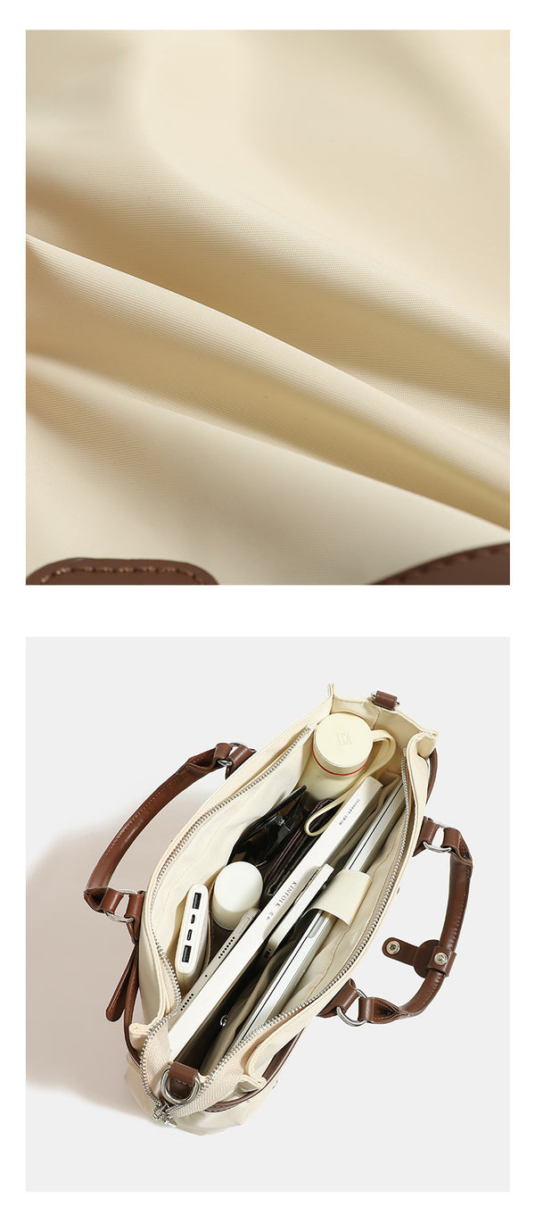 Strukturierte wandelbare Tote-Bag aus mattem Nylon mit Besatz in brauner Lederoptik, Schnallendetail und Metallbeschlägen in Silberoptik
