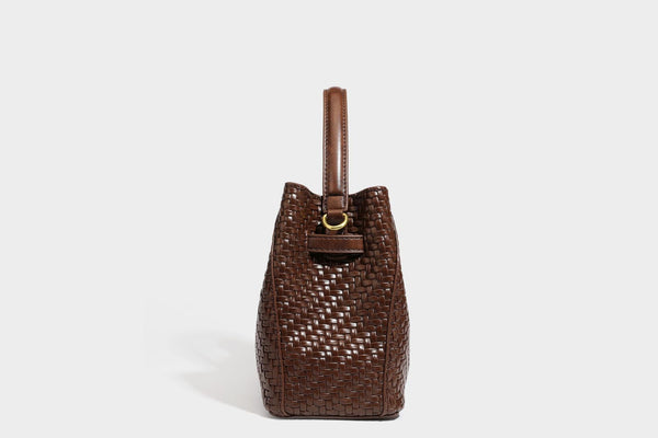 Structured woven leather-look bucket bag with gold-tone turn-lock hardware and detachable shoulder strap, detail view 34