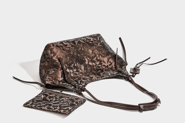 Slouchy crinkle-finish shoulder tote bag with silver hardware and attached zip pouch, detail view 34