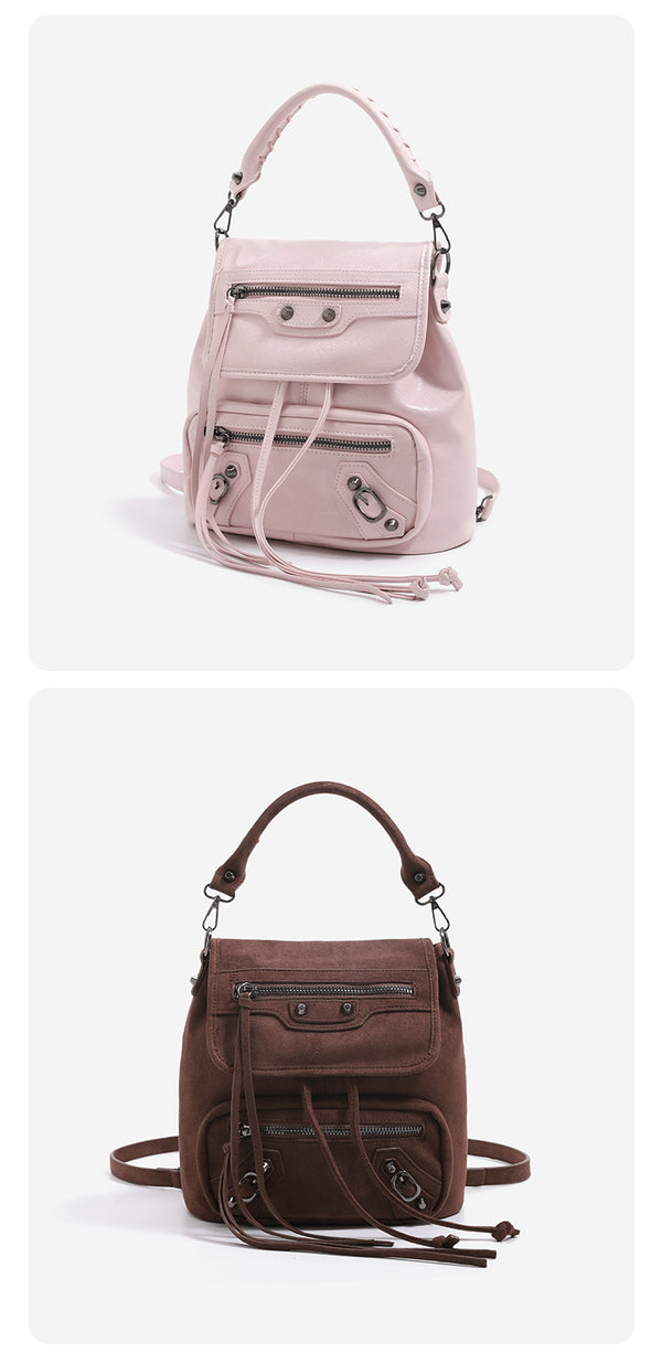 Mini flap backpack handbag with silver stud hardware, front zip pockets, and drawstring tassels, detail view 9