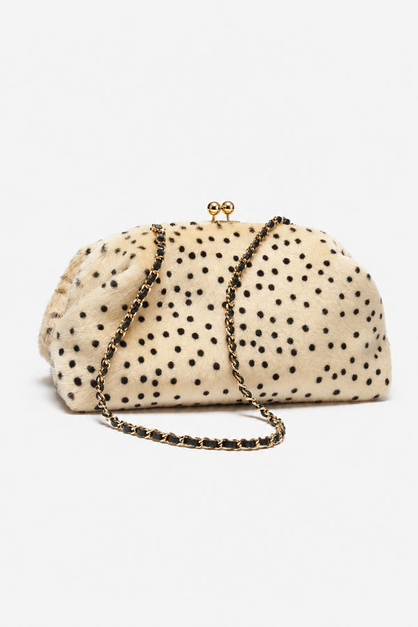 Rounded spotted faux-fur kiss-lock clutch bag with gold-tone chain strap in cream with black dot print, detail view 10