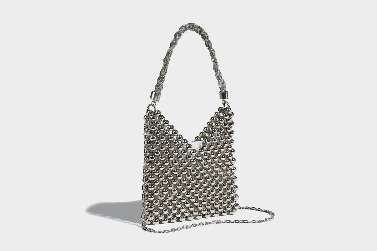 Small silver metallic beaded mini bag with braided rhinestone top handle and detachable chain crossbody strap, detail view 18