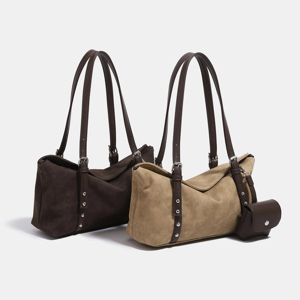 Soft slouchy suede-look shoulder tote with dark brown leather-look trim, silver-tone stud hardware, and attached snap-front