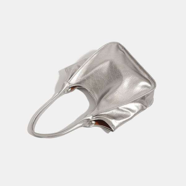 Large open-top shoulder tote bag with glossy crinkled metallic finish and long double straps, detail view 4