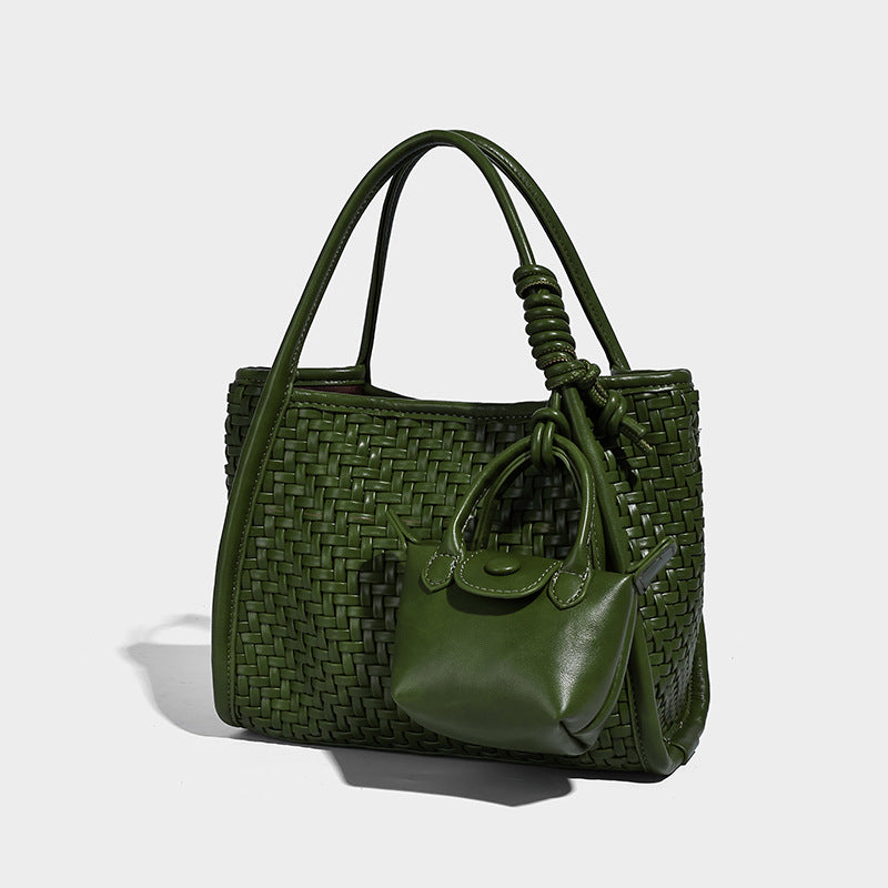 Woven texture open-top tote bag with smooth trim top handles and attached mini drawstring pouch in dark brown, detail view 9