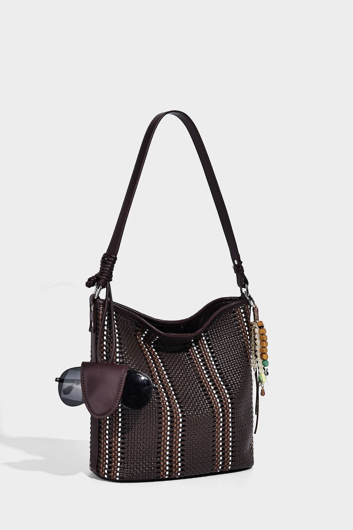 Woven bucket shoulder bag with leather-look trim, silver-tone hardware, and beaded tassel charm, detail view 20