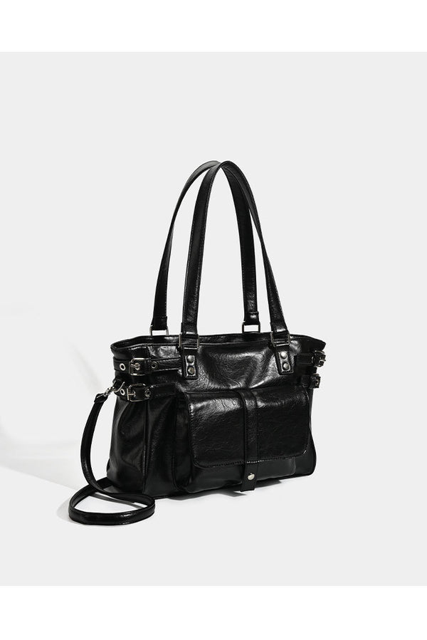 Large glossy leather-look tote bag with front flap pocket, silver-tone buckle hardware, dual top handles and detachable
