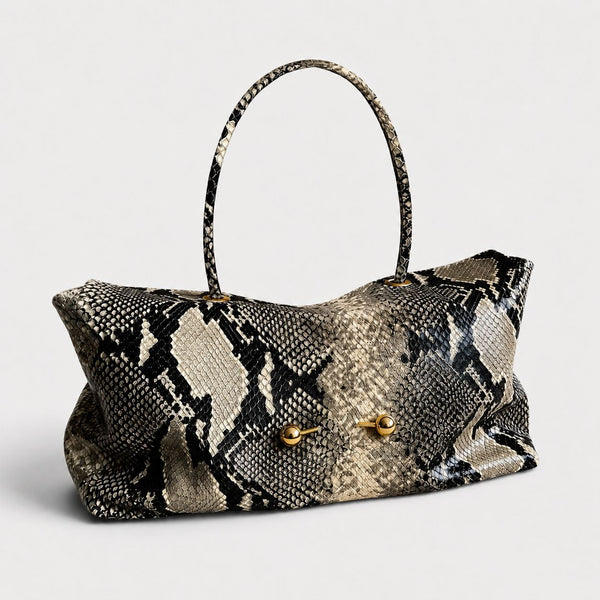 Wide embossed-texture shoulder tote bag with single loop handle and gold-tone toggle hardware, detail view 29