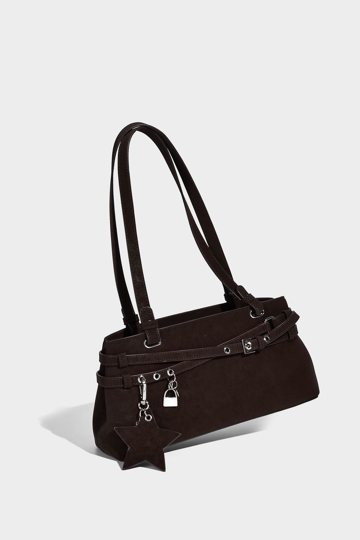 Structured trapezoid shoulder tote in dark brown matte suede-look finish with dual straps, wraparound belt bands