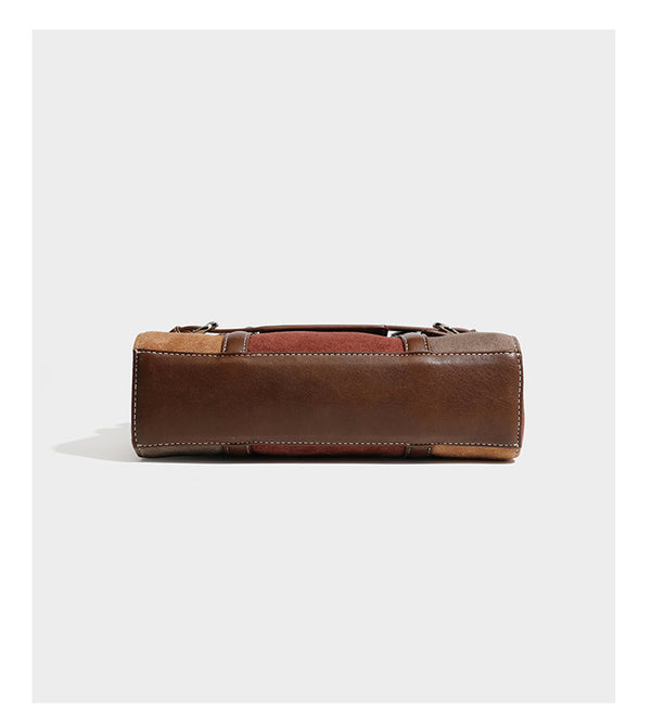 Structured color-block satchel bag in brown, rust, beige, and taupe suede-look panels with white topstitching, front buckle