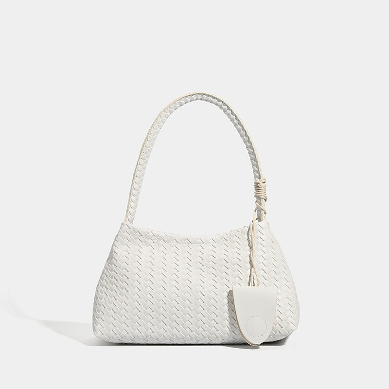 Woven leather-look shoulder bag with braided strap, trapezoidal body, and matching zip pouch, detail view 9