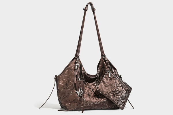 Slouchy crinkle-finish shoulder tote bag with silver hardware and attached zip pouch, detail view 26
