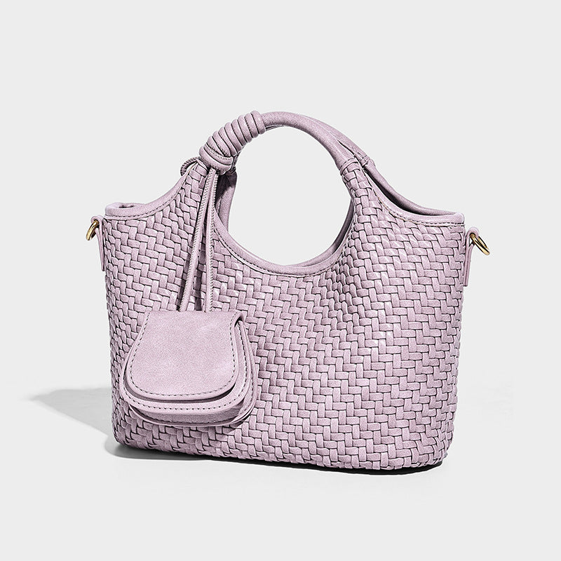 Woven texture tote bag with knotted top handles, attached front mini pouch, and gold-tone hardware, front view