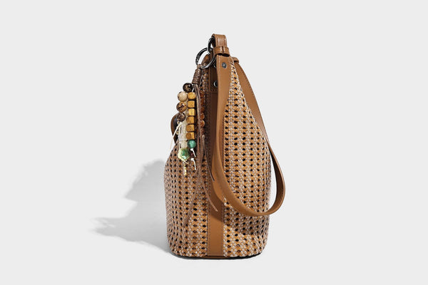 Slouchy open-weave hobo shoulder bag with leather-look trim, beaded tassel charm, and adjustable strap, detail view 22
