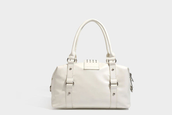 Glossy crinkled barrel handbag with silver stud buckle strap and detachable shoulder strap, detail view 22