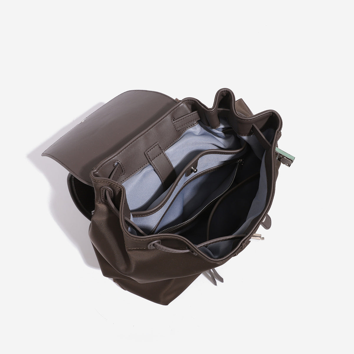 Large flap-top nylon backpack with leather-look trim, snap closure, front zip pocket, and padded shoulder straps, detail view