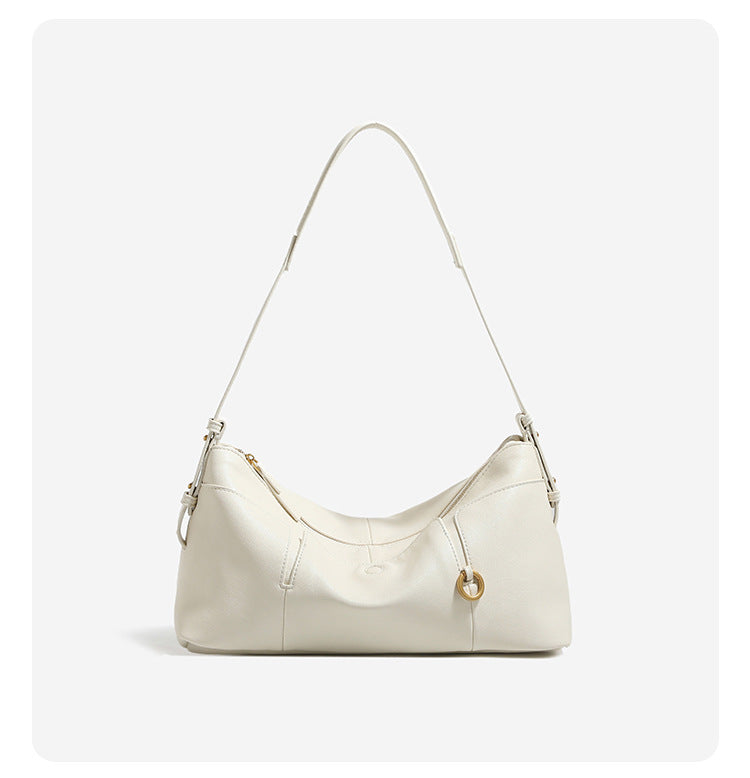 Slouchy hobo shoulder bag in smooth leather-look finish with zip closure and antique brass ring hardware, detail view 10