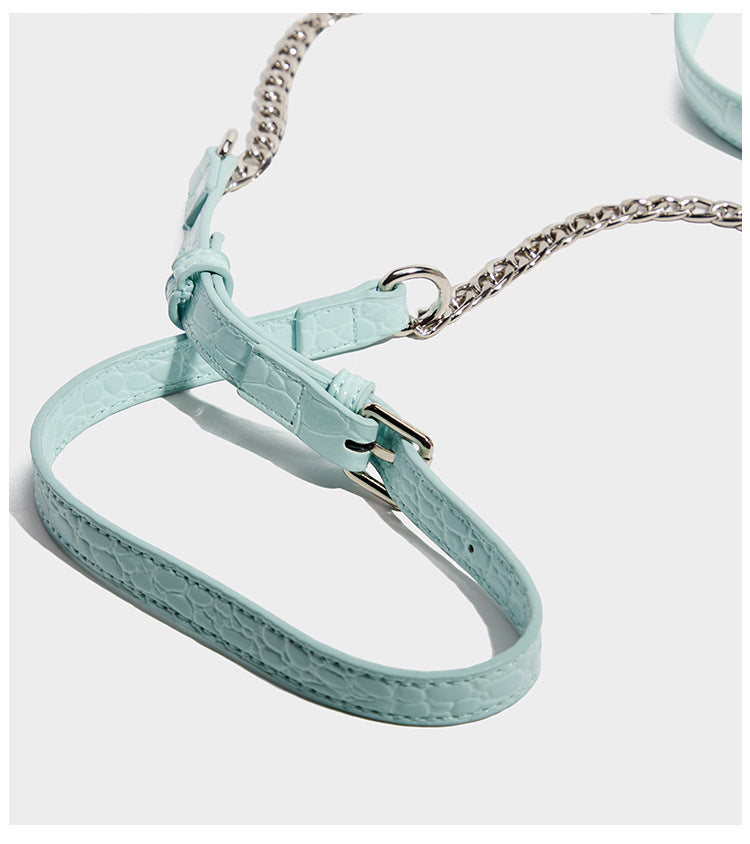 Glossy croc-embossed mini saddle bag with silver-tone turn-lock clasp and short top handle, detail view 14