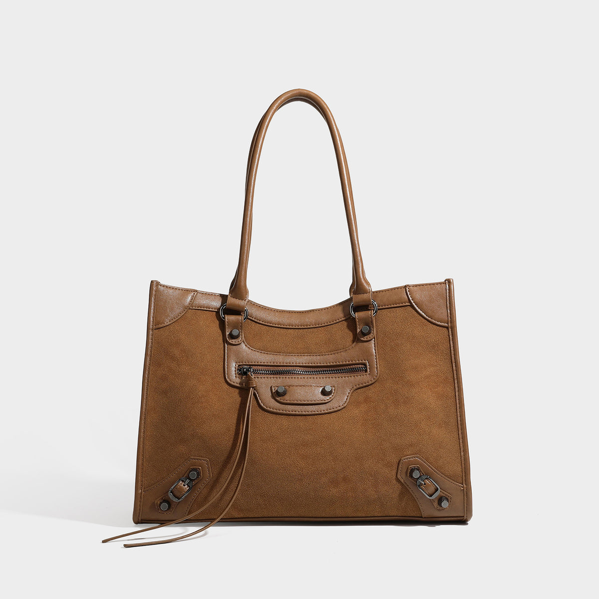 Large structured tote bag with matte suede-like body, smooth leather-look trim, front zip pocket, stud hardware, and