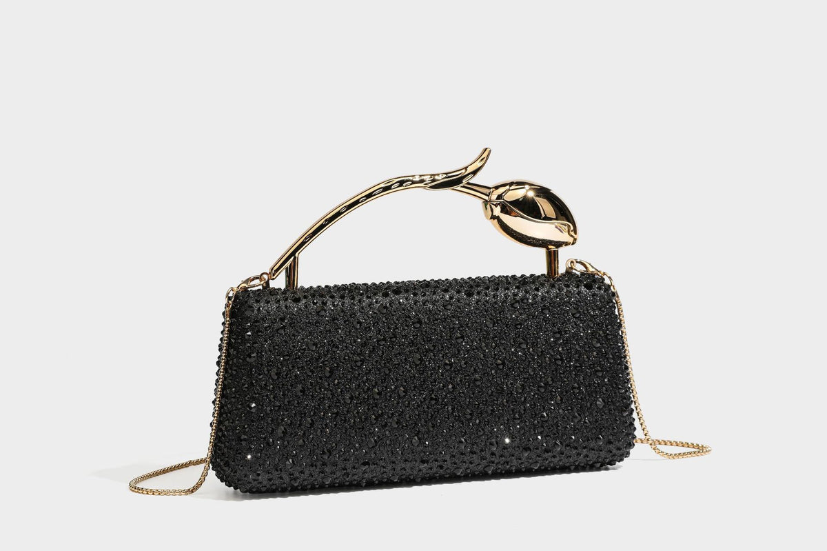 rectangular hard-case rhinestone evening clutch with sculptural gold-tone branch-and-bud top handle and detachable chain