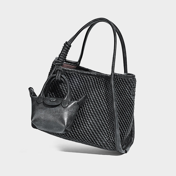 Large structured woven rope-texture tote bag with smooth leather-look trim, knotted dual top handles, detachable mini front