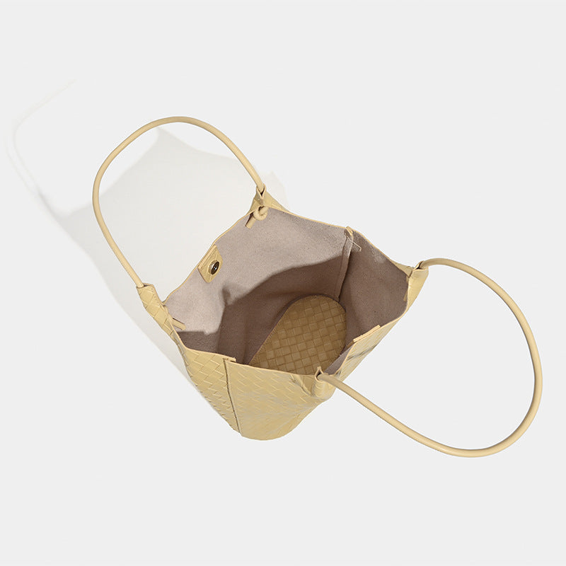 Large woven-texture open-top tote bag with single shoulder strap in butter yellow, detail view 4