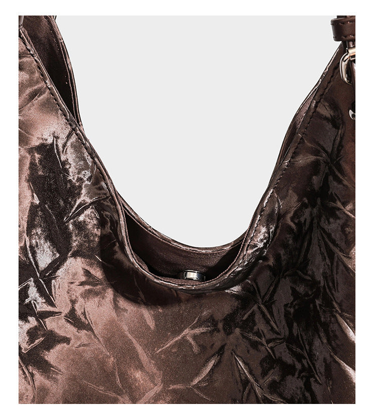 Slouchy crinkle-finish shoulder tote bag with silver hardware and attached zip pouch, detail view 18