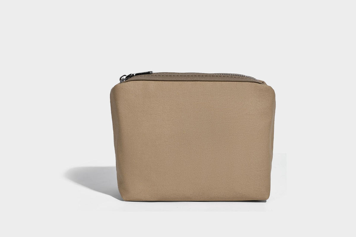 Compact pebbled bucket tote bag with elephant charm, twin top handles, and detachable crossbody strap, detail view 21