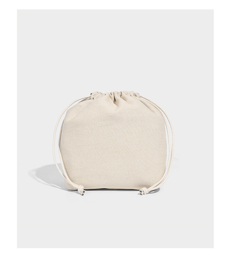 Structured pebbled leather-look tote bag in taupe with long shoulder strap, detachable zip pouch, and pink tulip flower