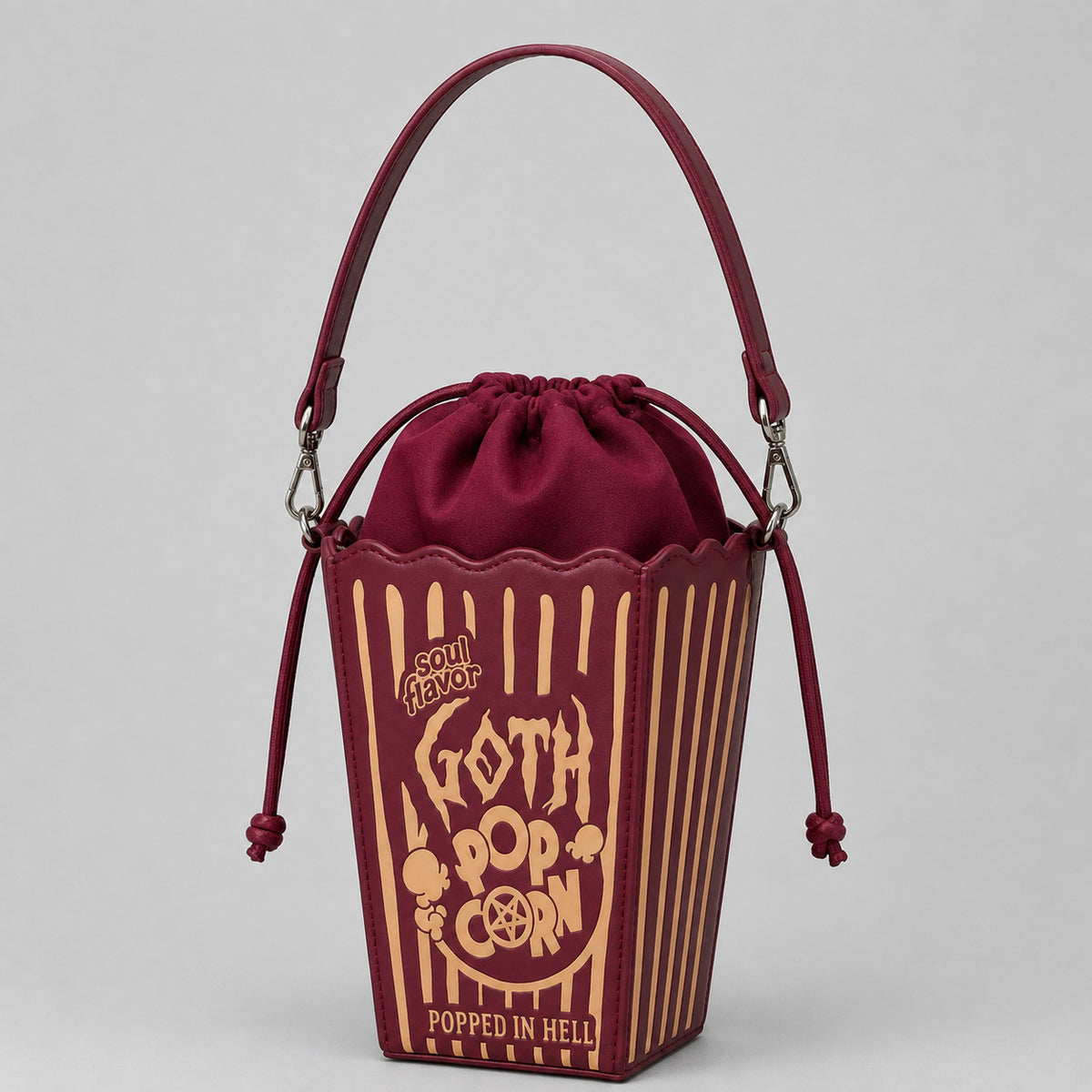 Burgundy gothic popcorn bucket drawstring crossbody bag with gold graphic print and silver-tone chain strap, detail view 4