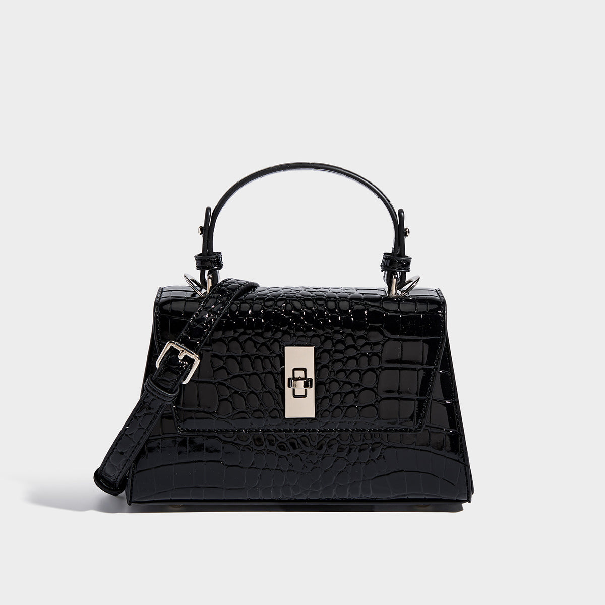 Small structured crocodile-embossed glossy top-handle satchel bag with silver-tone turn-lock clasp and detachable shoulder