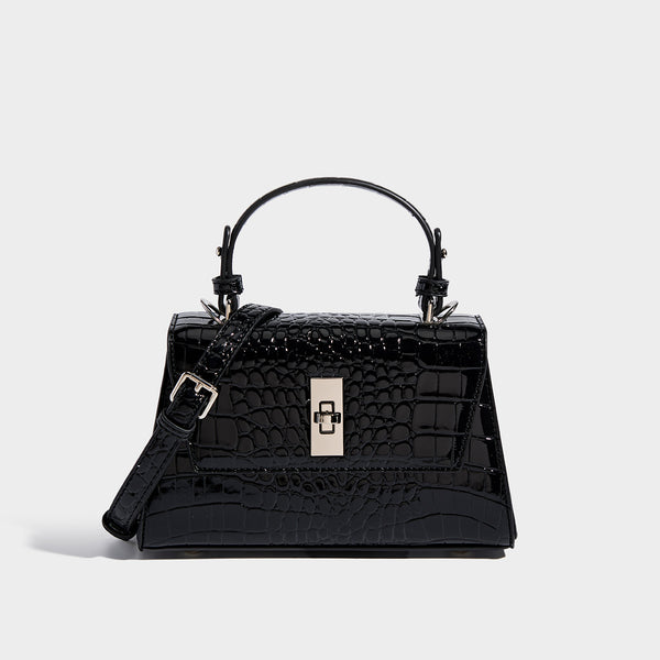 Small structured crocodile-embossed glossy top-handle satchel bag with silver-tone turn-lock clasp and detachable shoulder