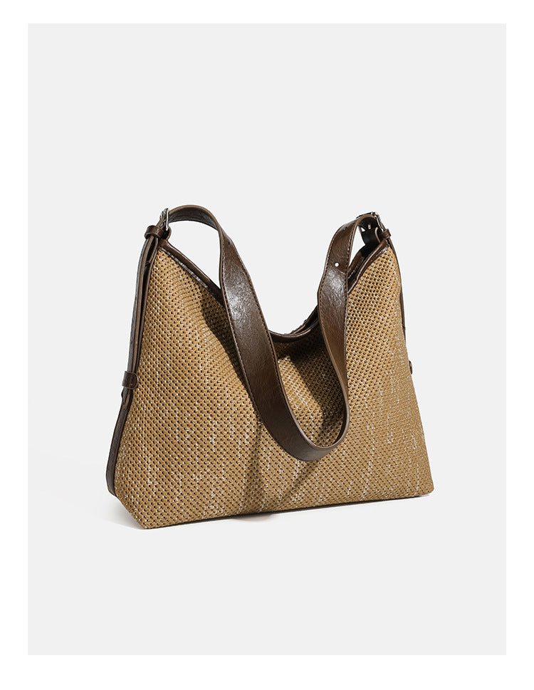Large slouchy woven shoulder bag with dark brown leather-look trim and adjustable strap, detail view 10
