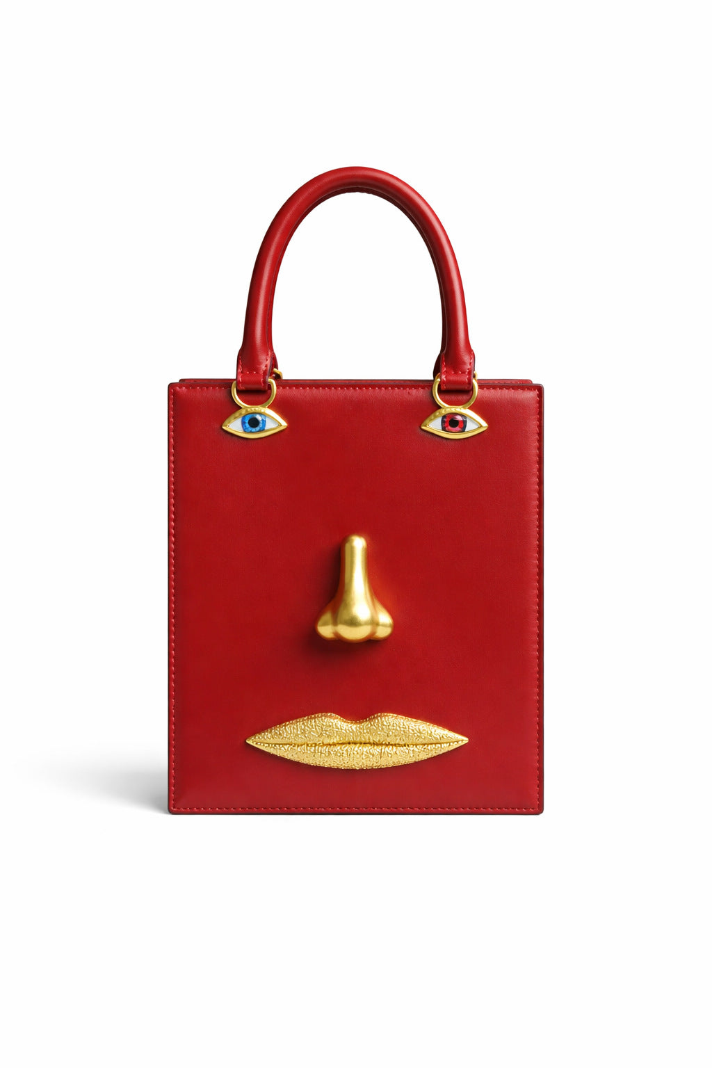 Structured rectangular top-handle bag in tan leather-look finish with gold-tone sculptural face hardware including