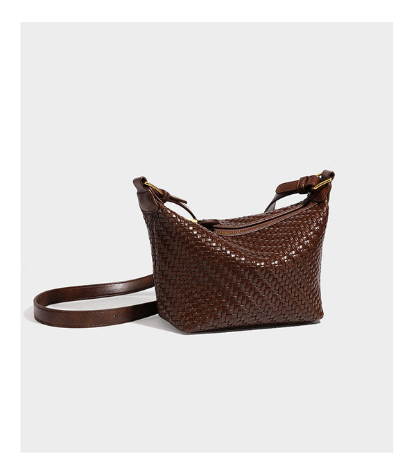 Small glossy basket-weave hobo shoulder bag in brown with knotted top handle, flap accent pocket, and gold-tone hardware