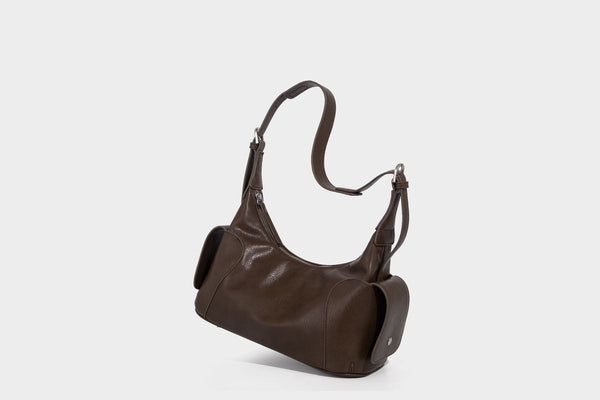 Soft pebbled leather-look hobo shoulder bag with zip top closure, side flap pockets, and silver-tone hardware, detail view 30