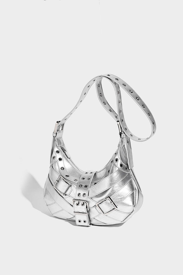 Glossy crescent hobo bag with silver-tone grommets, square buckle straps, and top zipper closure, detail view 15