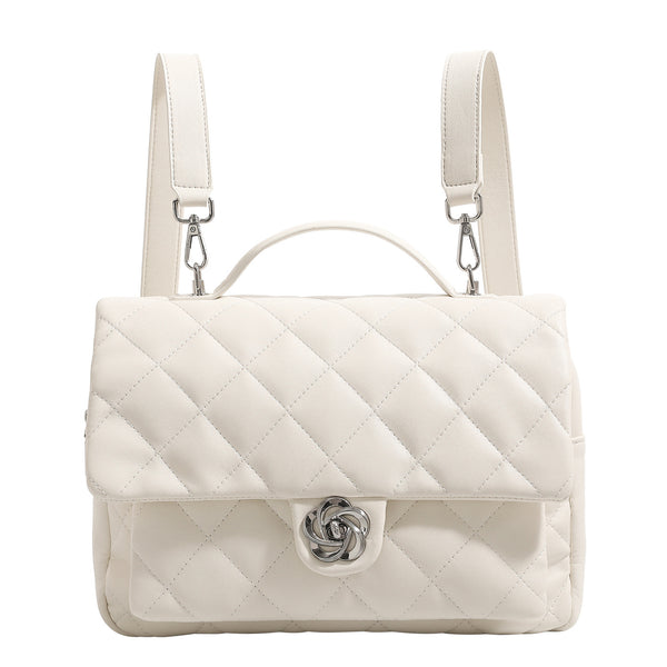 Diamond-quilted flap backpack handbag with silver-tone flower turn-lock, top handle, and dual shoulder straps, detail view 5