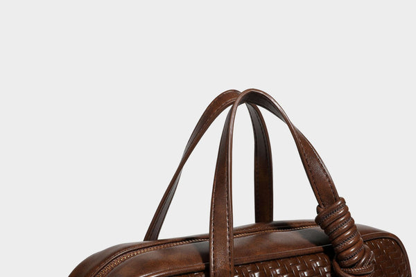 Strukturierte rechteckige Satchel-Tasche mit gewebtem Vorderteil in Lederoptik, goldfarbenen Details, zwei Tragegriffen und abnehmbarem