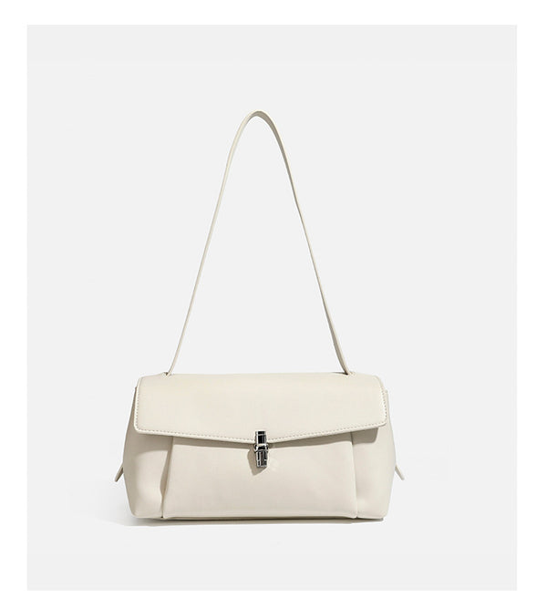 Structured rectangular flap shoulder bag with smooth leather-look finish, silver-tone turn-lock clasp, and long slim