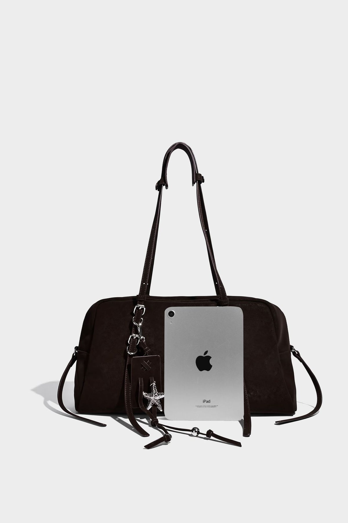Structured rectangular matte suede-like shoulder bag with silver-tone hardware, zip closure, double top handles, and, detail