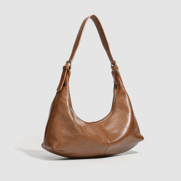 Slouchy crescent hobo shoulder bag with zip-top closure and adjustable strap, detail view 3