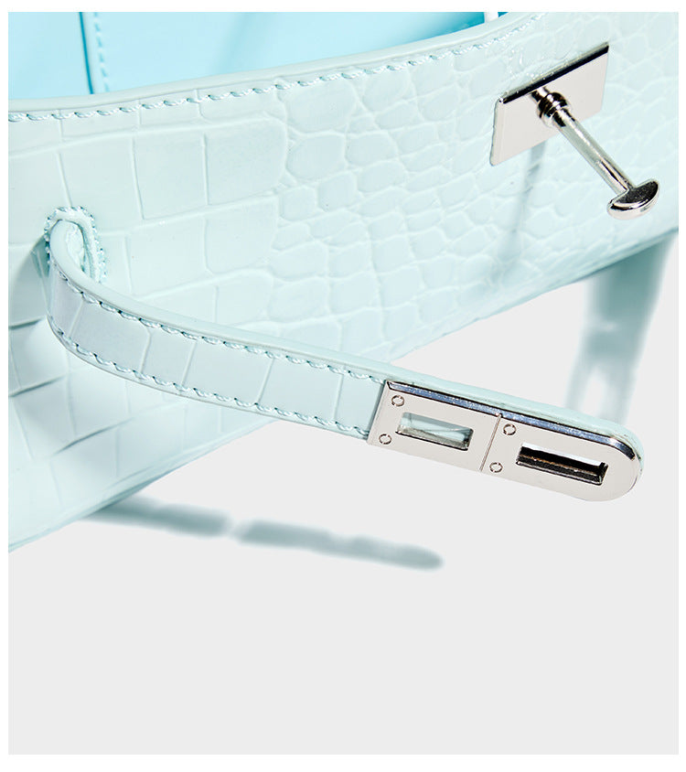 Compact structured flap satchel with glossy crocodile-embossed leather-look finish, silver-tone turn-lock hardware, and