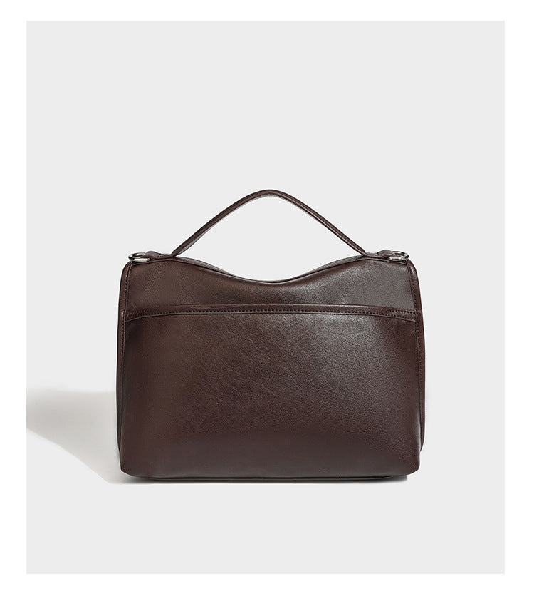 Structured rectangular satchel bag in dark espresso brown with smooth leather-look finish, flap front with silver turn-lock
