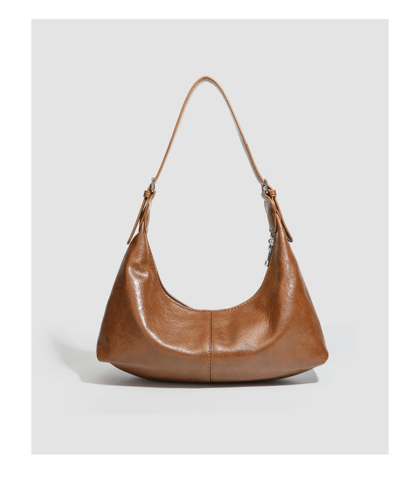 Slouchy crescent hobo shoulder bag with zip-top closure and adjustable strap, detail view 12