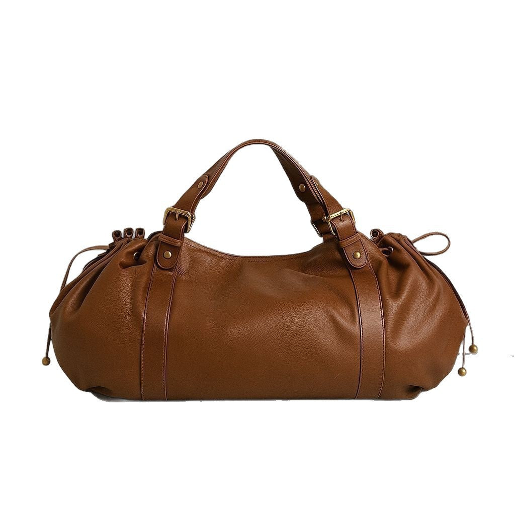 Lässige Barrel-Shopper-Tasche mit seitlichen Zugbändern, zwei Tragegriffen und goldfarbenen Schnallenbeschlägen, Detailansicht 9