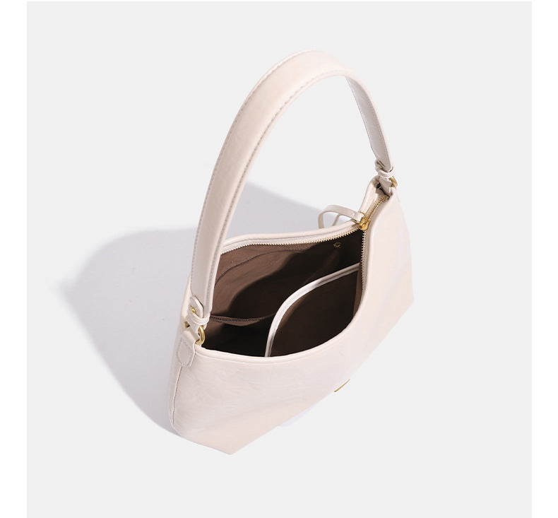 Large crinkled leather-look hobo shoulder bag with zip closure and gold-tone hardware, detail view 12