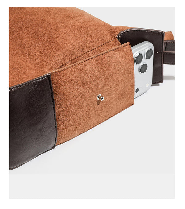 Slouchy cognac brown matte suede-look hobo shoulder bag with dark brown leather-look trim, top zip closure, front flap